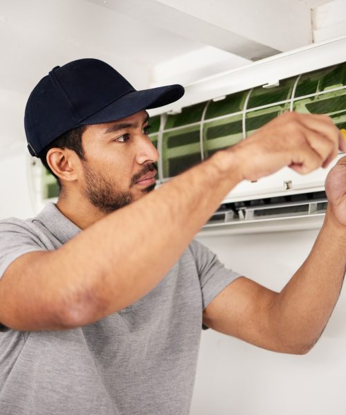 Maintenance, air conditioner technician and man with screwdriver working on ventilation for ac repa